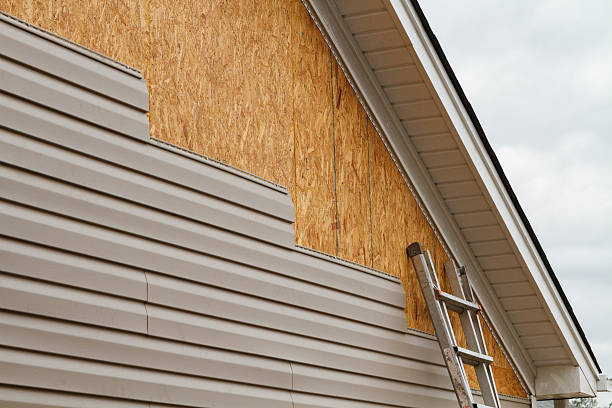 Professional Siding Contractor technician working in Midlothian, VA